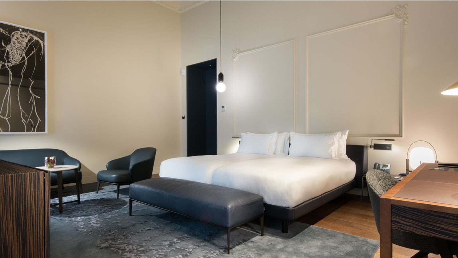 Junior suite bedroom in Mercer Sevilla Hotel