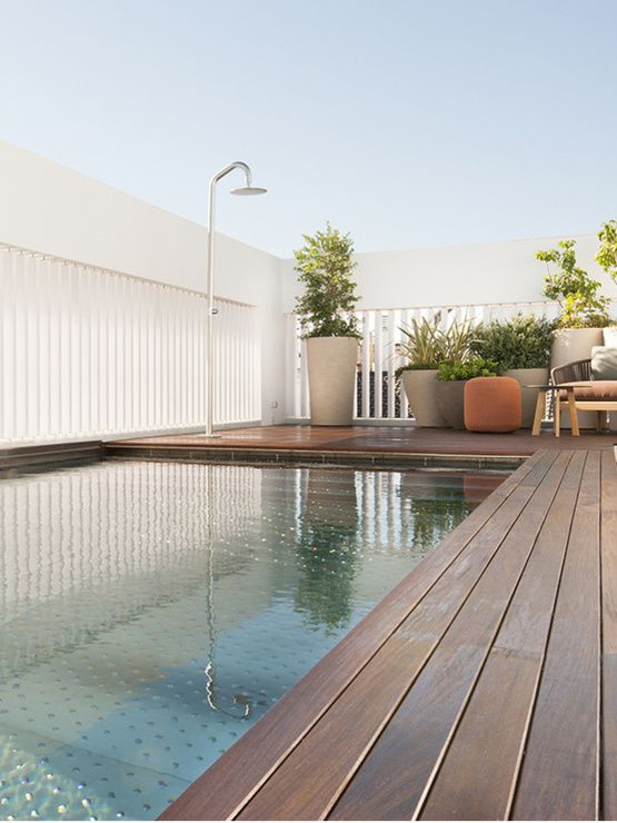 Outdoor rooftop terrace with swimming pool at the Hotel Mercer Sevilla